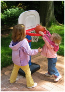 Children playing basketball.